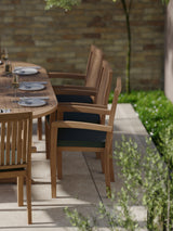 Teak Oval 180-240cm Extending Table with 8 Henley Stacking Chairs Cushions Included. Teak Oval 180-240cm Extending Table with 8 Henley Stacking Chairs Cushions Included.