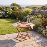 120cm Sunshine Round Teak Folding Table with 4cm Table Top - Premium Folding Outdoor Table - UK and Ireland garden setting - image 1 120cm Sunshine Round Teak Folding Table with 4cm Table Top - Premium Folding Outdoor Table - UK and Ireland garden setting - image 1