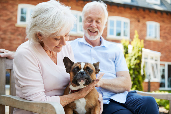 Teak Garden Furniture couple sitting with pet