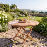 Teak Garden Furniture Spiral 120cm Round Folding Table 4cm Top - Sculptural Folding Teak Dining Table - UK and Ireland garden setting - image 2